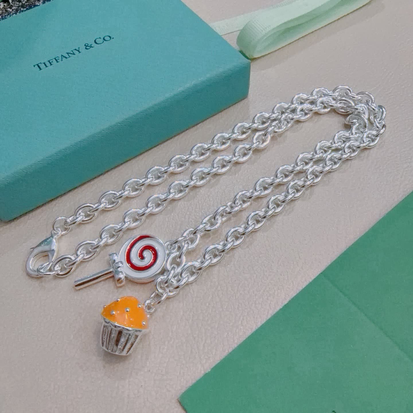 Tiffany & Co. Silver Charm Necklace with Lollipop and Cupcake Charms